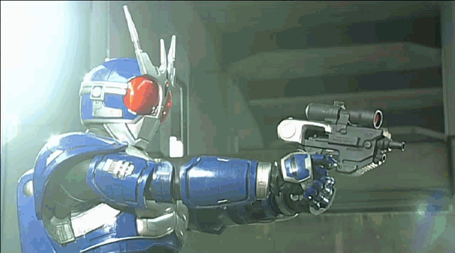 a man in a robot costume is holding a gun