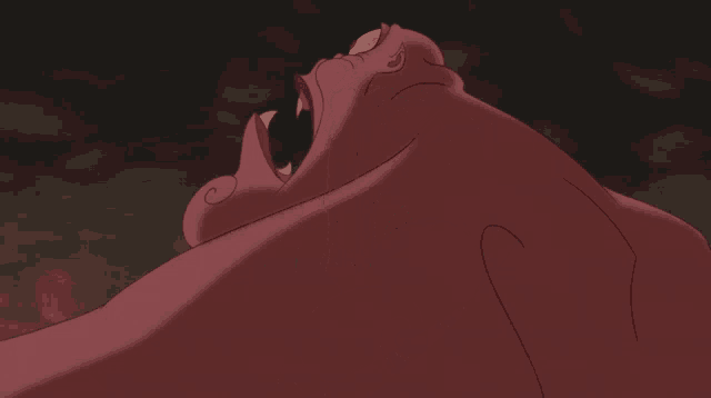 a close up of a cartoon character 's face with big teeth