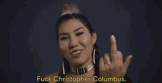 a woman is giving the middle finger to christopher columbus