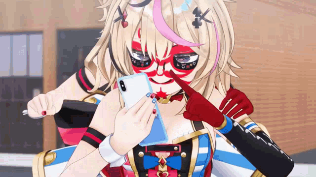 a girl with a red face paint is holding a phone