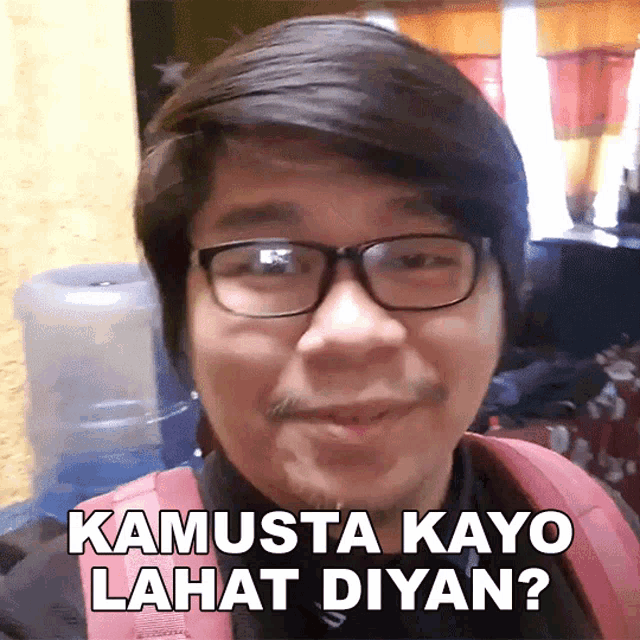 a man wearing glasses says kamusta kayo lahat diyan ?