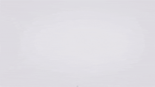 a bunch of blue and white balls are floating around a gray object