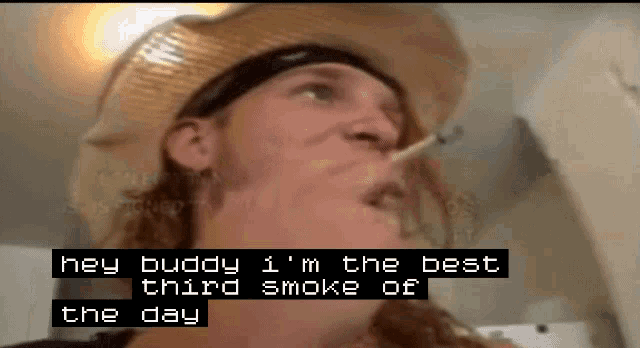 a man in a cowboy hat smoking a cigarette with the words hey buddy