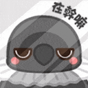 a cartoon bird with chinese writing on it is sitting on a table .
