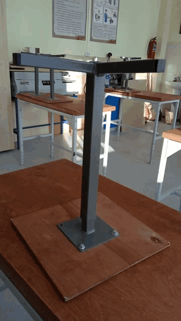 a wooden table with a metal frame on it