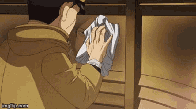 a man wipes his face with a towel in a gif that says imgflip.com at the bottom