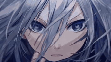a close up of a person 's face with blue eyes and long white hair .