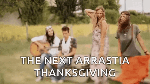 a group of people are standing in a field with the words `` the next arrastia thanksgiving '' in the background .