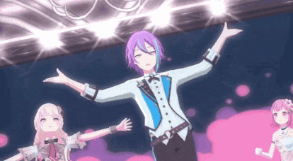a man with purple hair is standing on a stage with his arms outstretched .