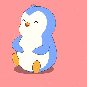 a penguin is laying on its back with its eyes closed