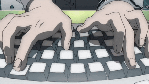 a person is typing on a keyboard with the letter o on the top left corner