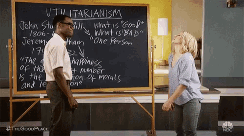 a man and a woman are standing in front of a blackboard that says utilitarianism