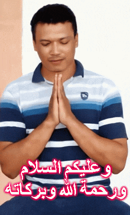 a man in a blue and white striped shirt prays