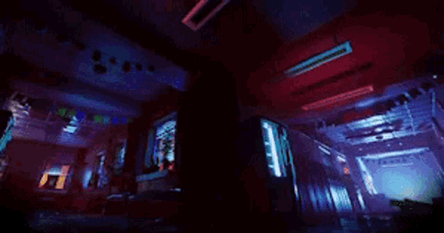 a dark room with a lot of lights on the ceiling and walls