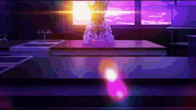 a pixel art of a person sitting at a table