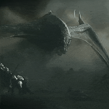 a black and white photo of a monster with wings