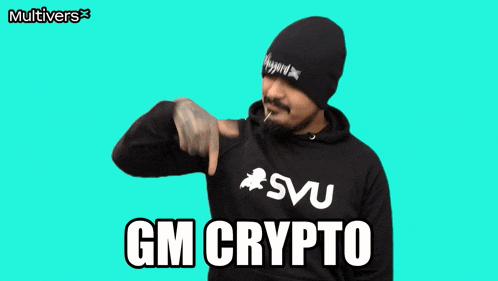 a man wearing a black hoodie that says gm crypto on it