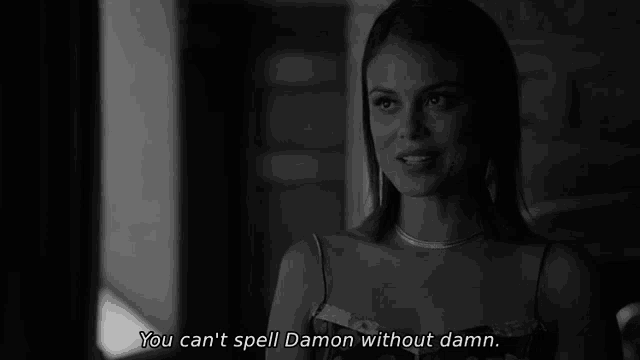 a black and white photo of a woman with the words `` you can 't spell damon without damn '' .