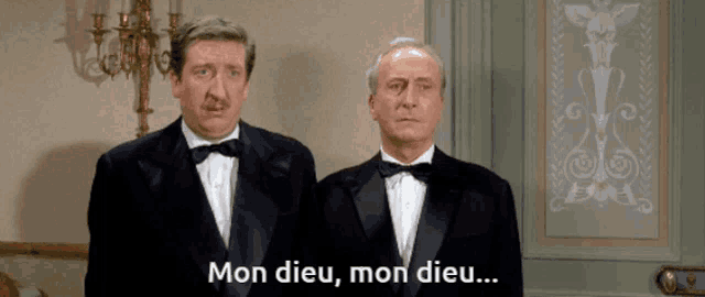 two men in tuxedos standing next to each other with mon dieu mon dieu written on the bottom
