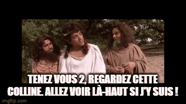 a group of men dressed as jesus standing next to each other .
