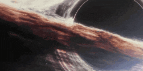 an artist 's impression of a black hole in the center of a galaxy