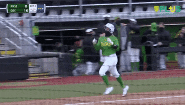 a baseball player wearing a green uniform that says buckeyes on it