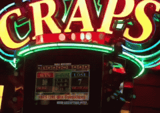 a slot machine that says grapes on the top