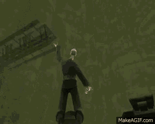 a helicopter is flying over a building in the dark .