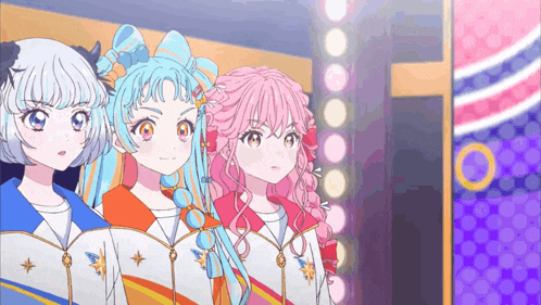 three anime girls are standing next to each other in a row