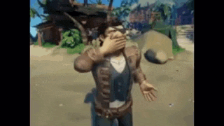 a man is covering his mouth in a video game while standing on a beach .