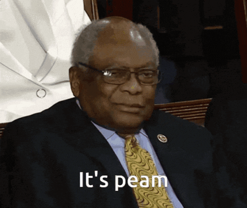 a man in a suit and tie with the words it 's peam below him
