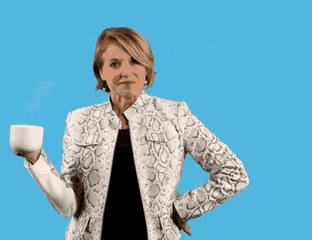 a woman in a snake print jacket is holding a cup of coffee in front of a blue background that says good morning