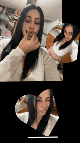 a woman is taking a selfie with a heart shaped mirror