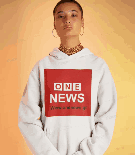 a woman wearing a hoodie that says one news on it