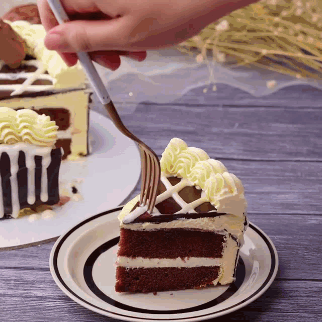 a slice of cake on a plate with a fork in it