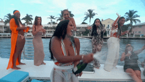Popping Champagne Nique Brown GIF - Popping Champagne Nique Brown Ashley Snell GIFs