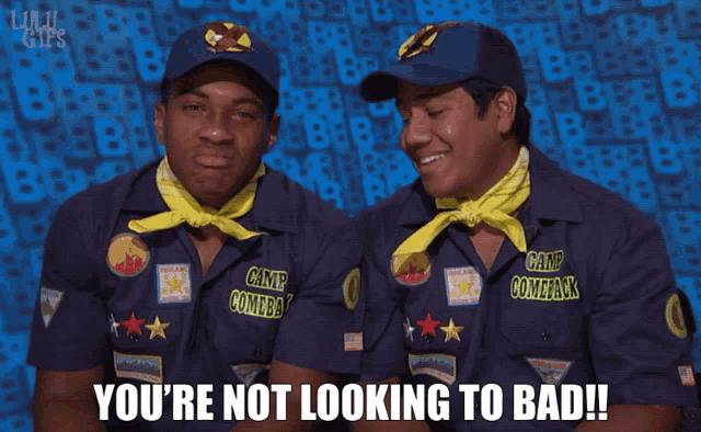 two men in camp comeback uniforms are sitting next to each other