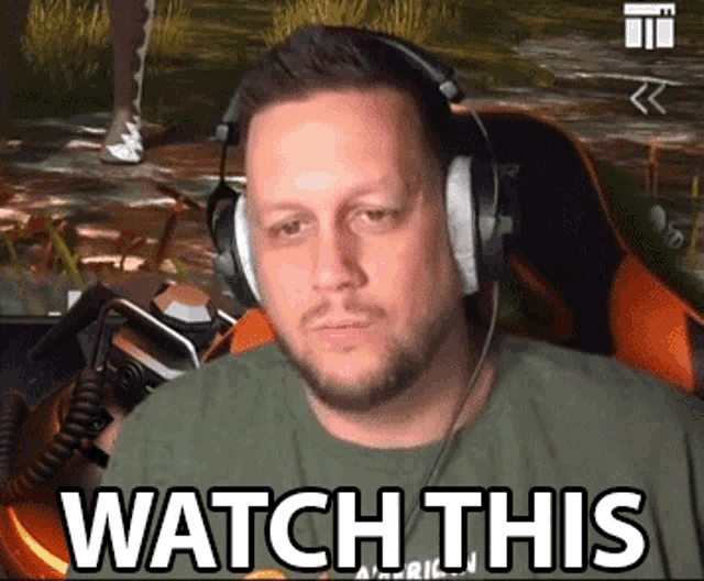 a man wearing headphones says watch this