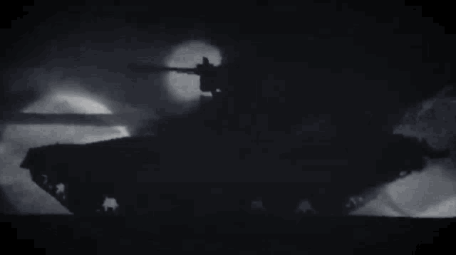 a black and white photo of a tank with the letters aa on the side