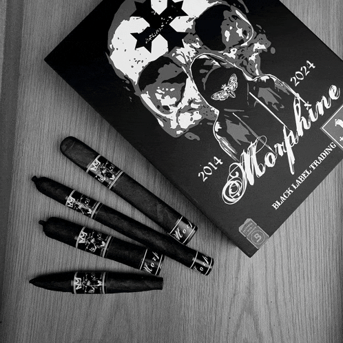 a box of black label trading morphine cigars sits on a table