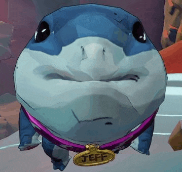 a close up of a shark with a collar and a name tag on it .