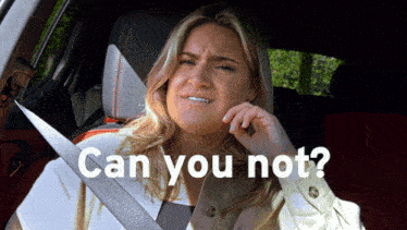 a woman is sitting in a car with the words can you not behind her