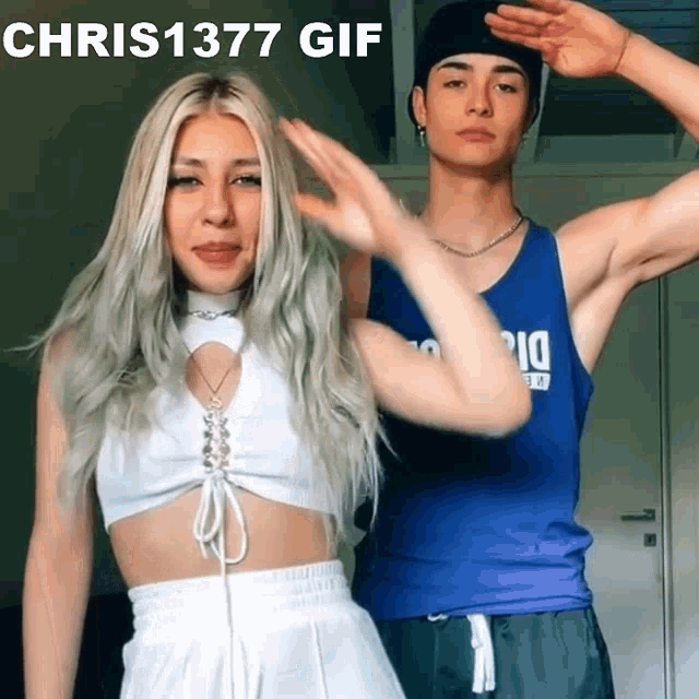 a man and a woman are posing for a photo with the caption chris1377 gif