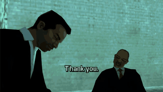 a man in a suit says thank you to another man in a suit