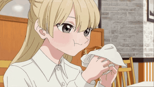 a blonde anime girl is eating a sandwich