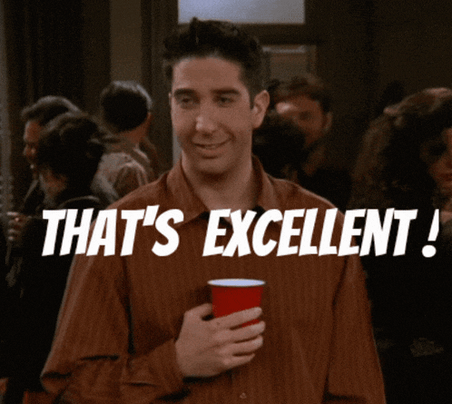 a man holding a red cup with the words that 's excellent