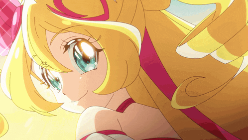 a close up of a cartoon character with yellow hair