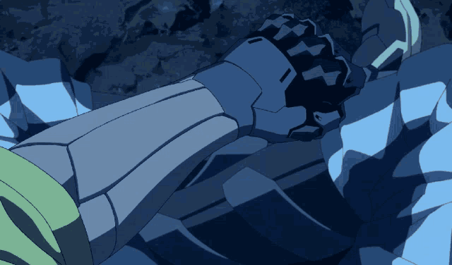 a close up of a robot 's arm with a black glove on