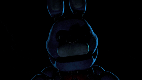 a purple animated character with a microphone in its mouth