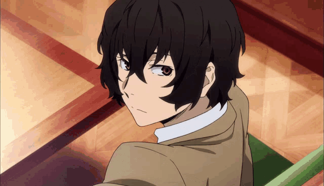 a close up of a person 's face with black hair and red eyes